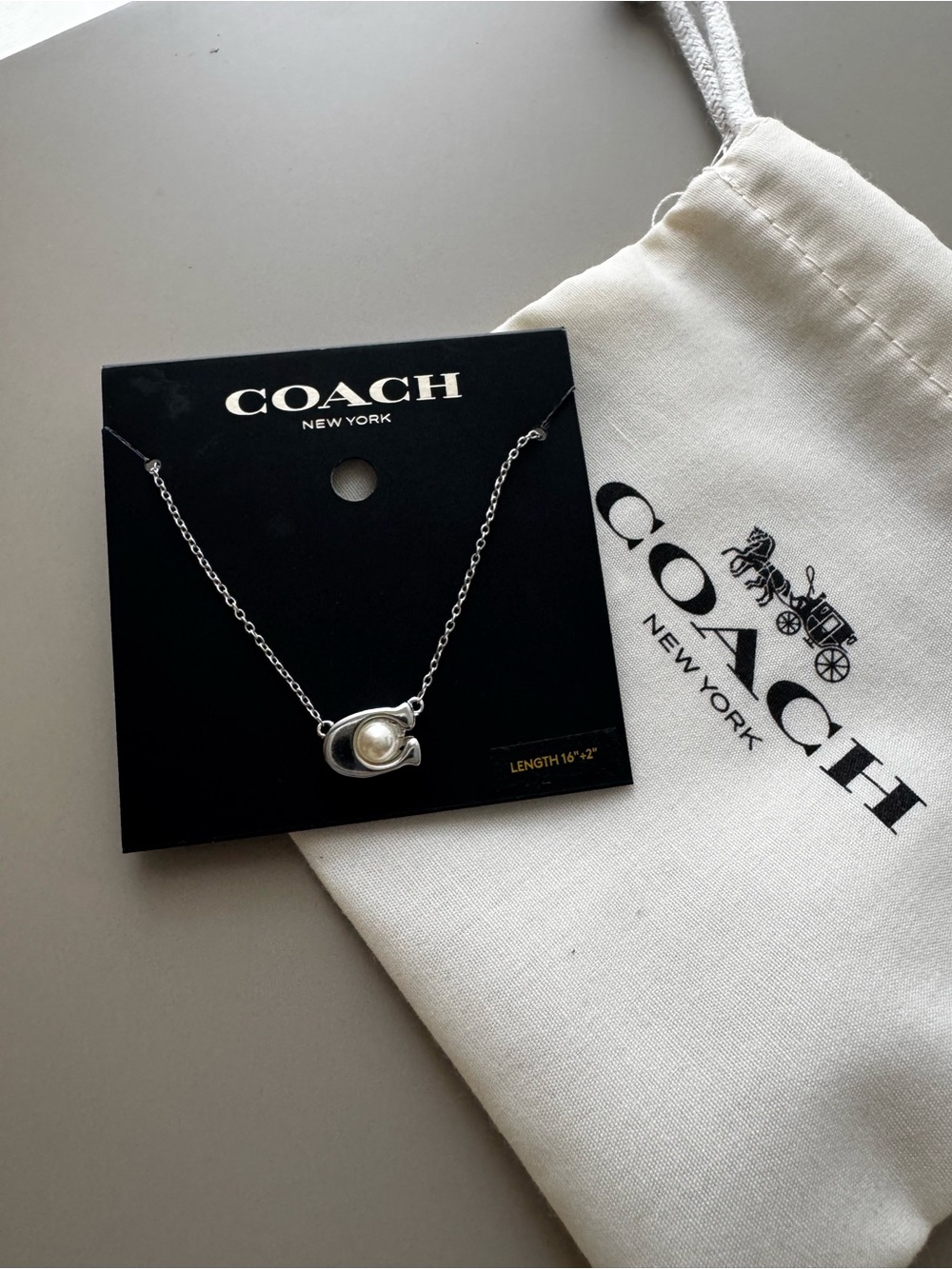 Coach Silver-tone 'C' Necklace with Pearl Accent